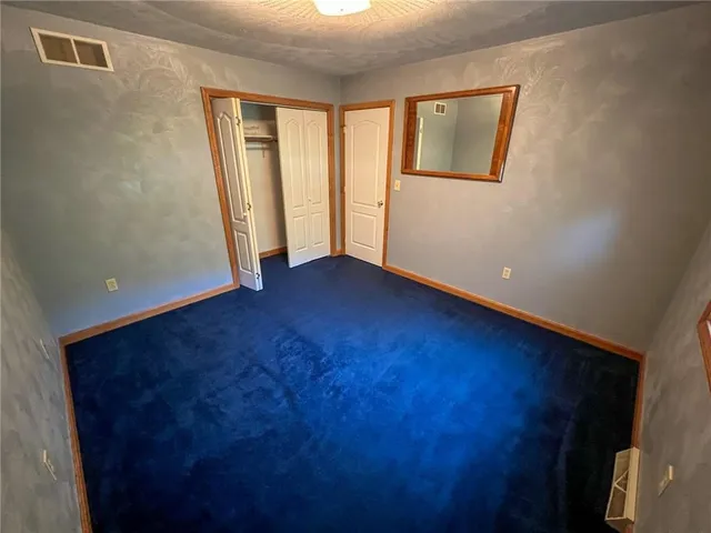 an empty room with window