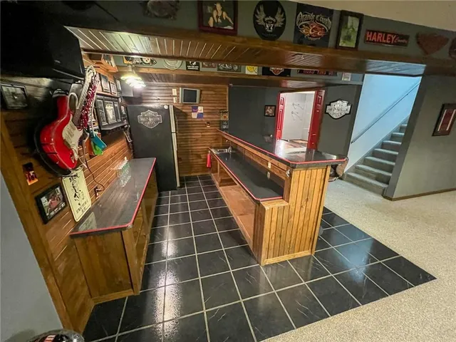 a utility room with furniture and air hockey table