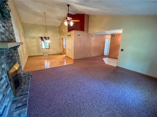 a view of a livingroom with a fireplace