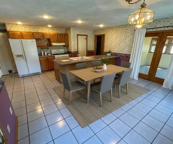 a view of a dining room with furniture