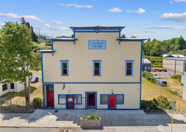a view of a house with a street