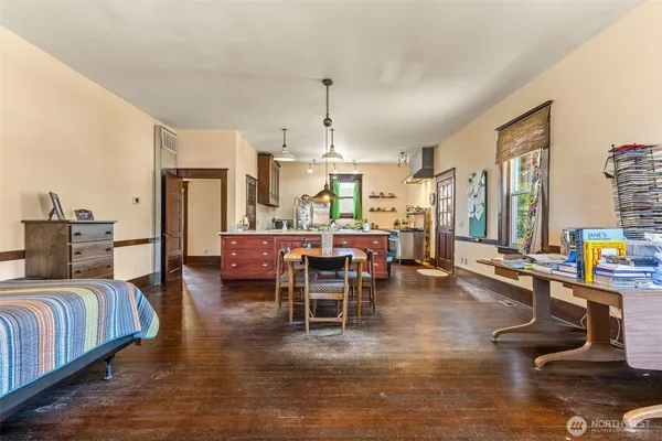 a room with furniture and a window