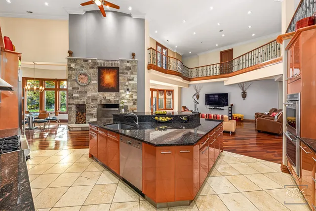 a living room with furniture or couch and a large window