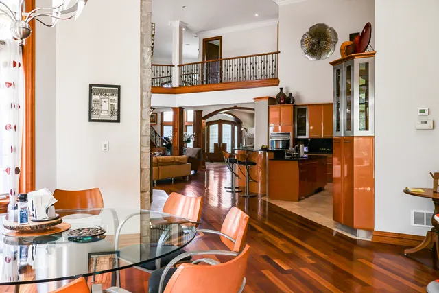 a living room with furniture rug and a fireplace