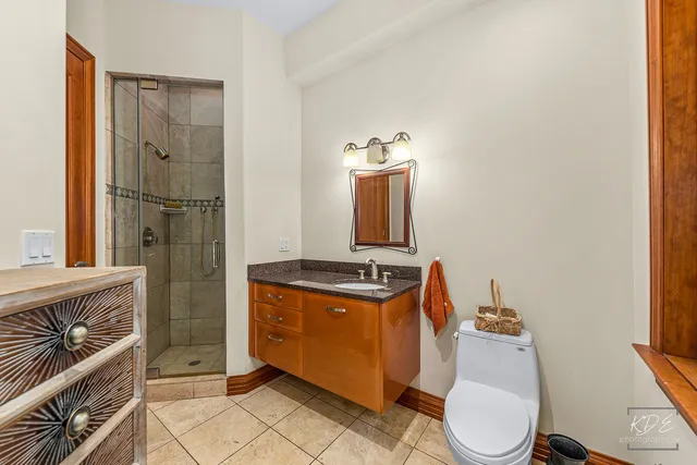 a living room filled with furniture and a window