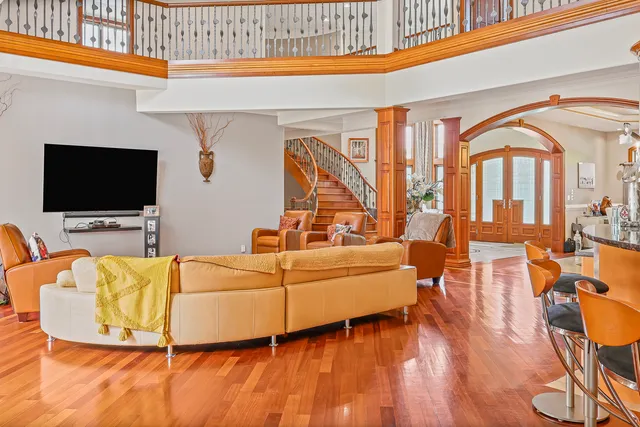 a bathroom with a mirror a bathtub and a shower
