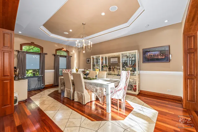 an aerial view of a house with garden space and street view