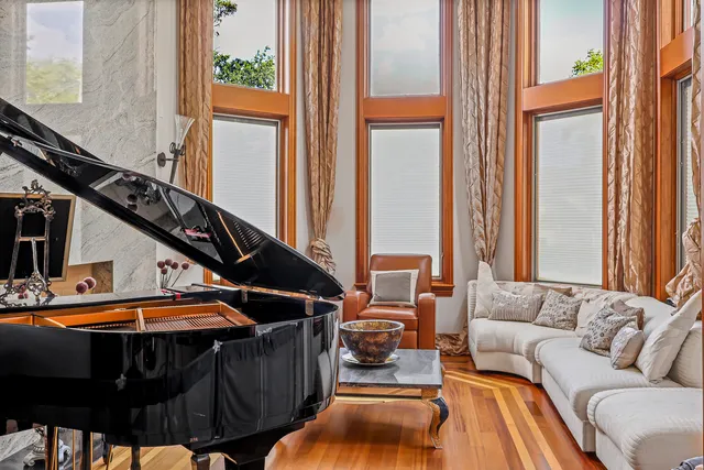a bathroom with a granite countertop shower sink and mirror