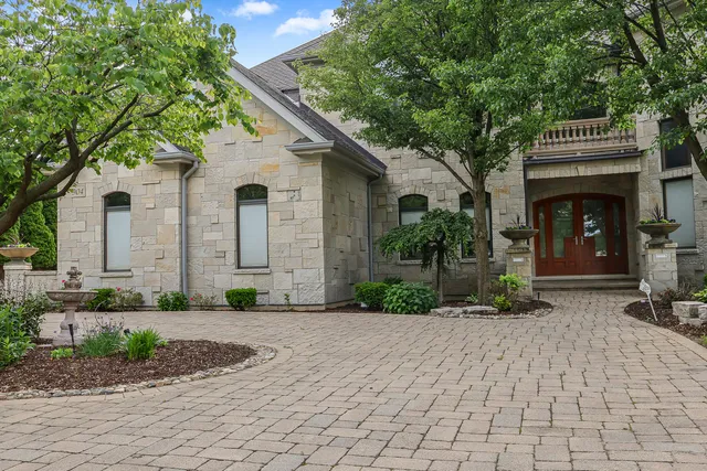 a front view of a house with yard
