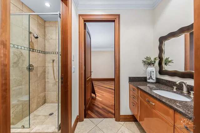a view of a dinning table and chairs in the patio of the house