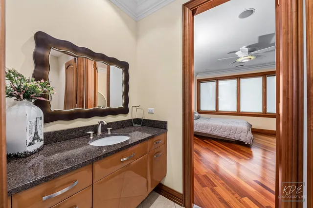 a view of a house with a big yard and potted plants