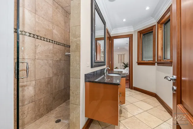 an aerial view of a house with outdoor space and street view