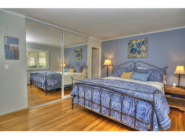 807 Haverhill Drive Sunnyvale, CA 94087 - Photo 12 of 20 a bedroom with a bed and a view of kitchen