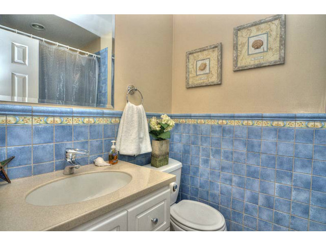 807 Haverhill Drive Sunnyvale, CA 94087 - Photo 15 of 20 a bathroom with a sink a toilet and a mirror