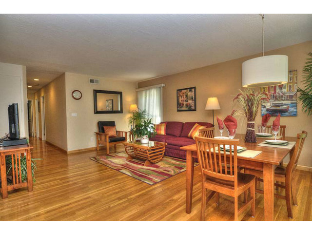 807 Haverhill Drive Sunnyvale, CA 94087 - Photo 7 of 20 a living room with furniture a flat screen tv and a table