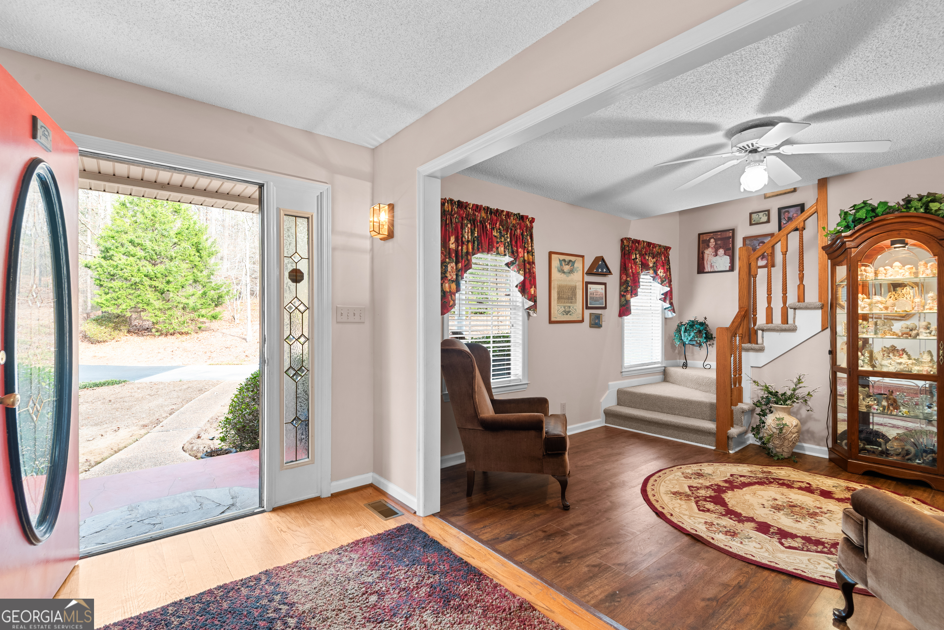 408 Parker Branch Road Barnesville, GA 30204 - Photo 8 of 69 a living room with furniture fireplace and a large window
