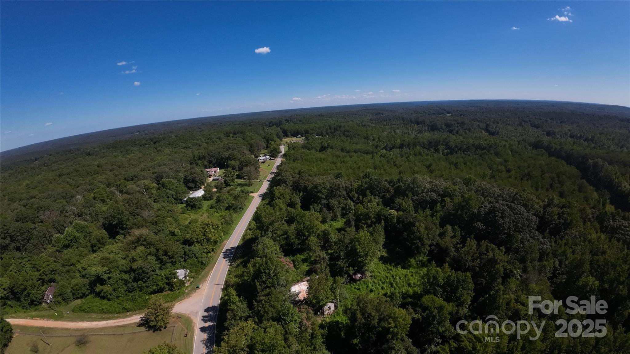 0 Old Chester Road Blacksburg, SC 29702 - Photo 11 of 16 a view of a city with lush green forest