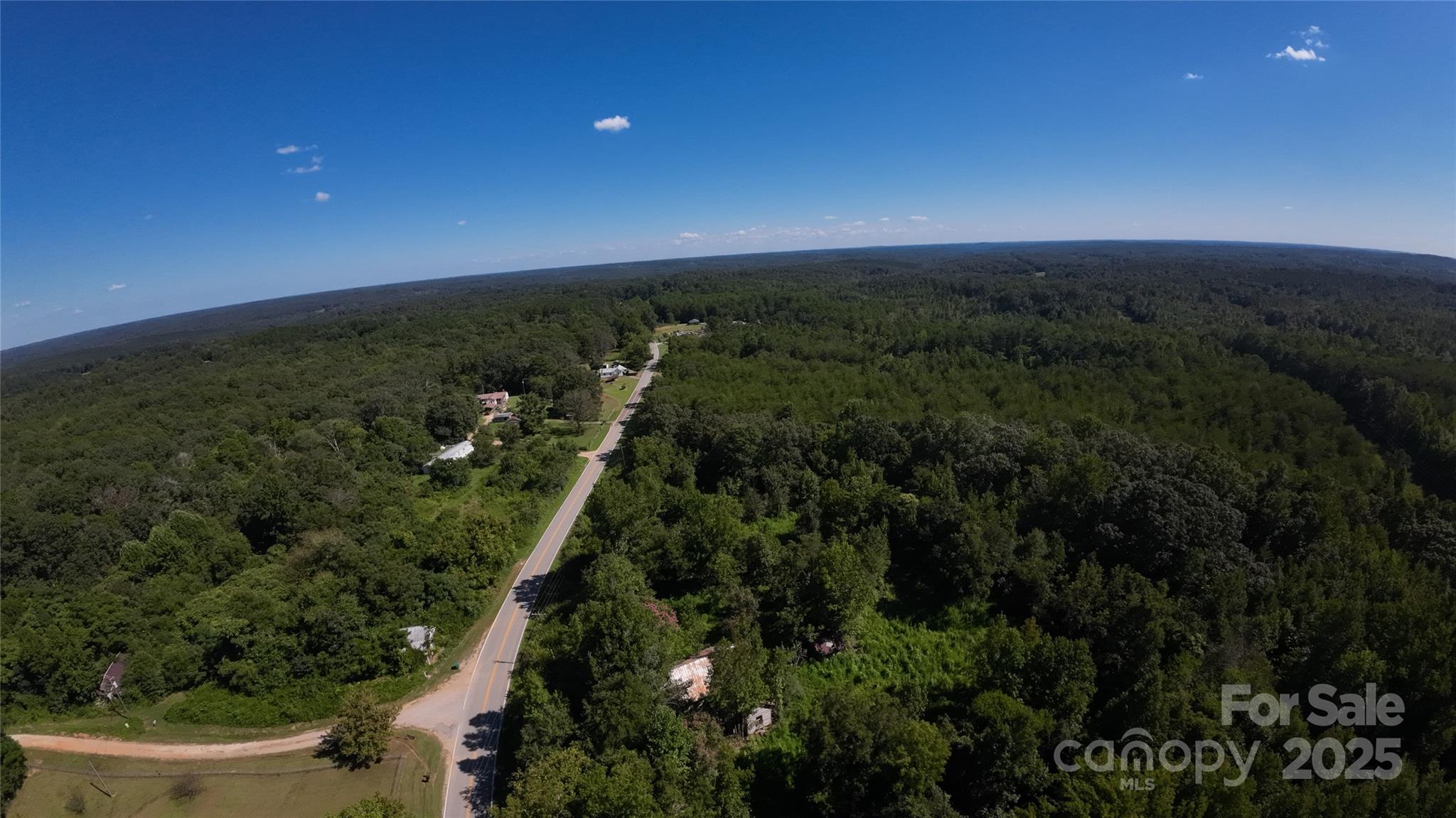 0 Old Chester Road Blacksburg, SC 29702 - Photo 12 of 16 a view of a city with lush green forest