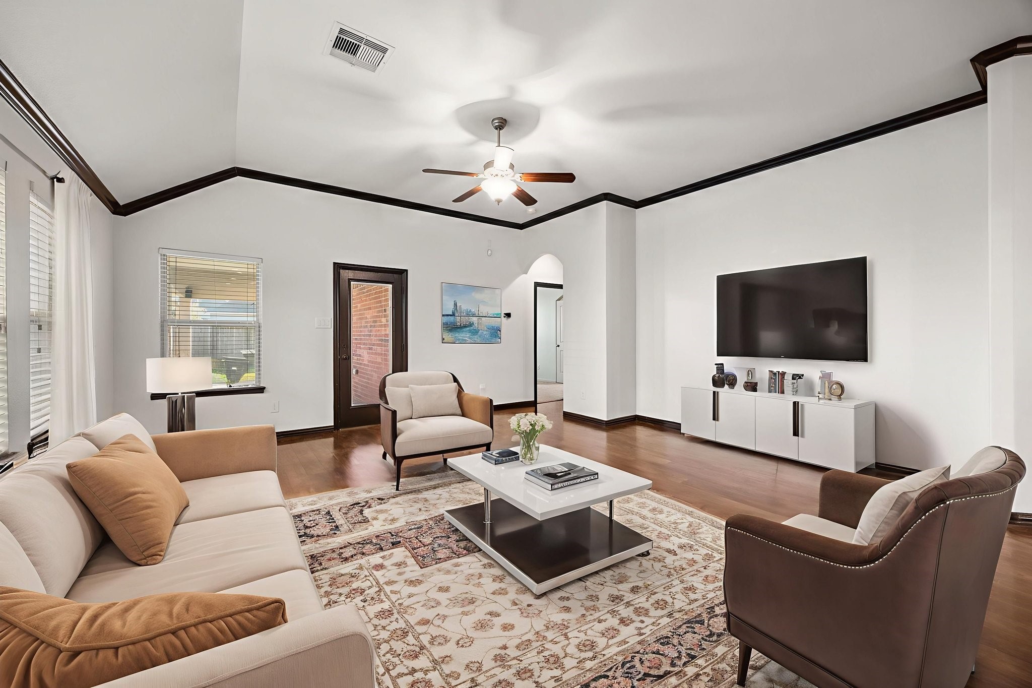 4342 Ambrosia Lane Baytown, TX 77521 - Photo 16 of 34 a living room with furniture and a flat screen tv