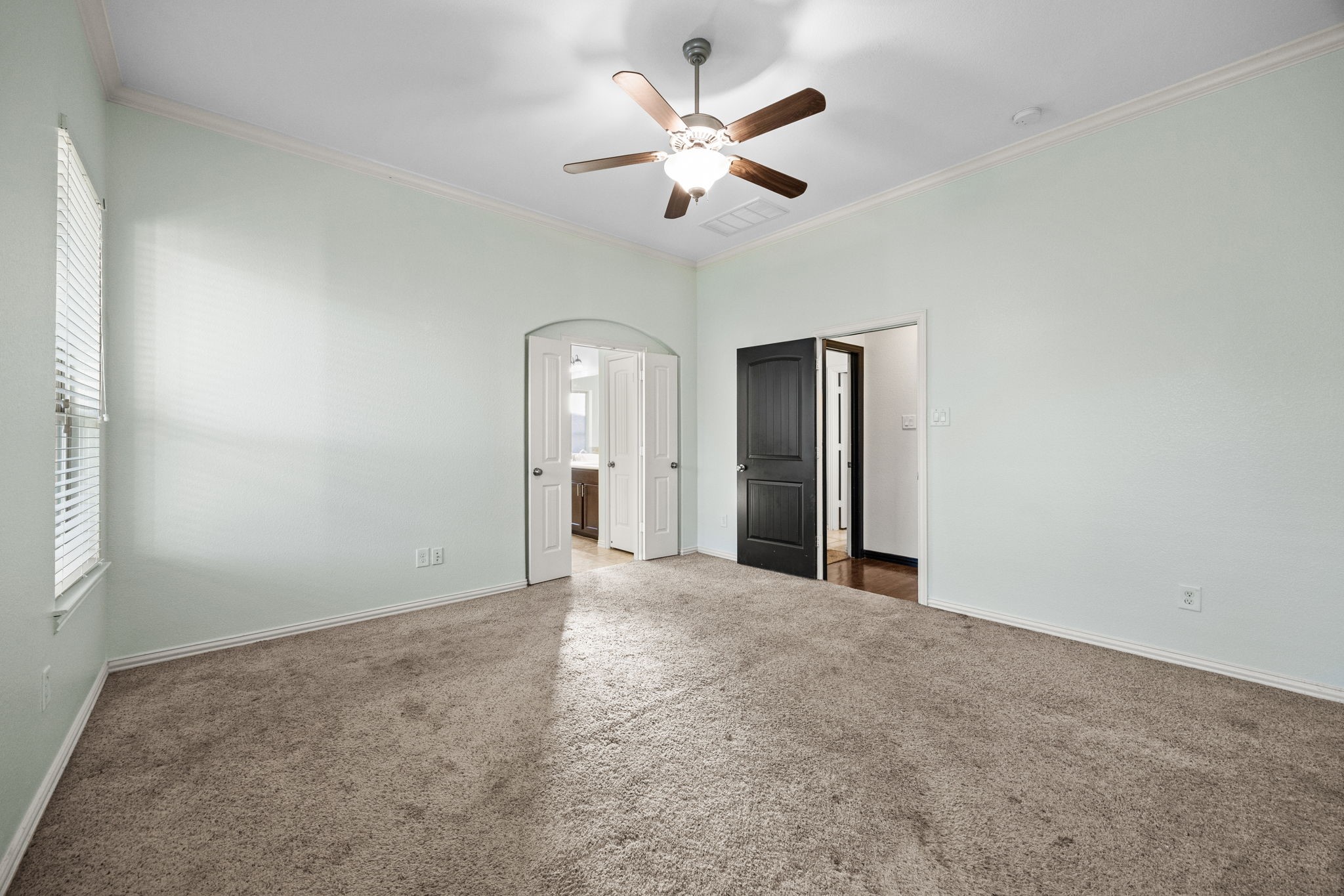 4342 Ambrosia Lane Baytown, TX 77521 - Photo 17 of 34 an empty room with fan and a ceiling fan