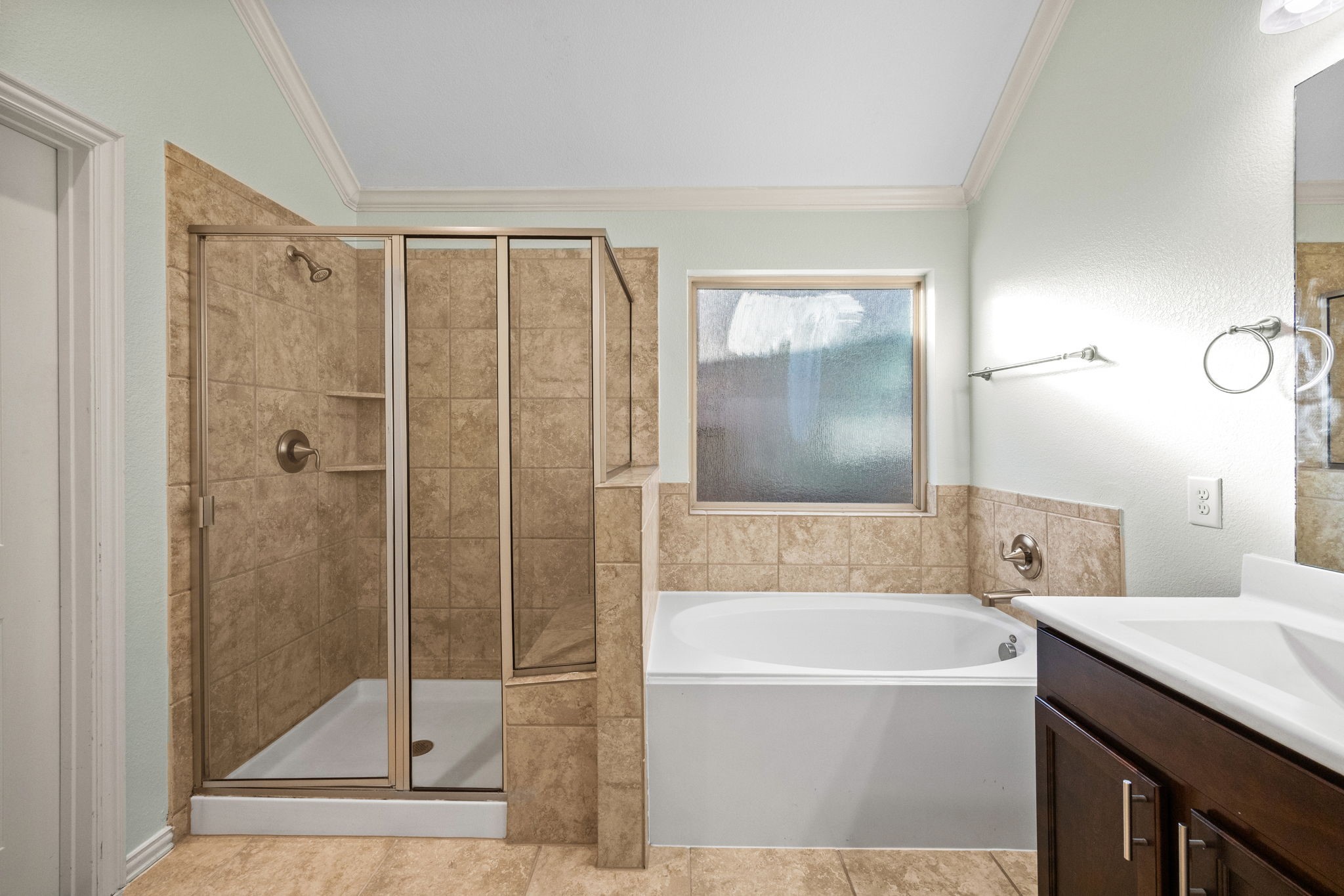 4342 Ambrosia Lane Baytown, TX 77521 - Photo 20 of 34 a bathroom with a bathtub and a shower