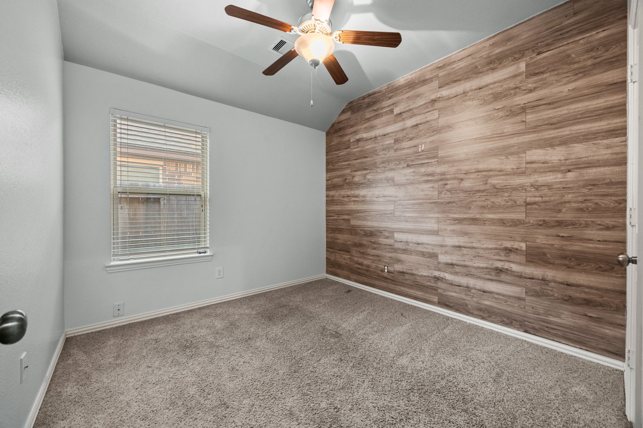 4342 Ambrosia Lane Baytown, TX 77521 - Photo 23 of 34 a view of an empty room with a window