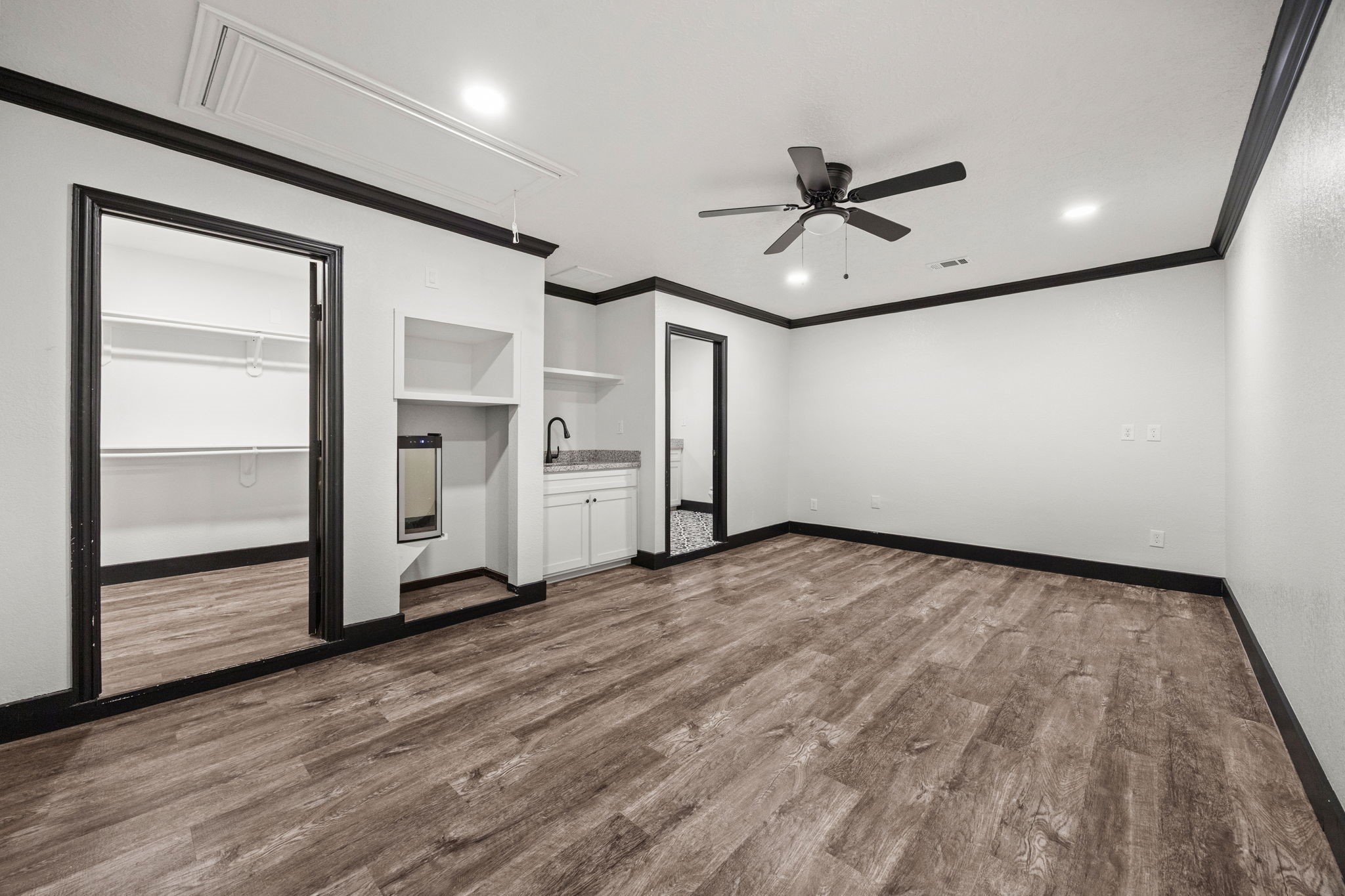 4342 Ambrosia Lane Baytown, TX 77521 - Photo 27 of 34 a view of empty room with wooden floor and ceiling fan