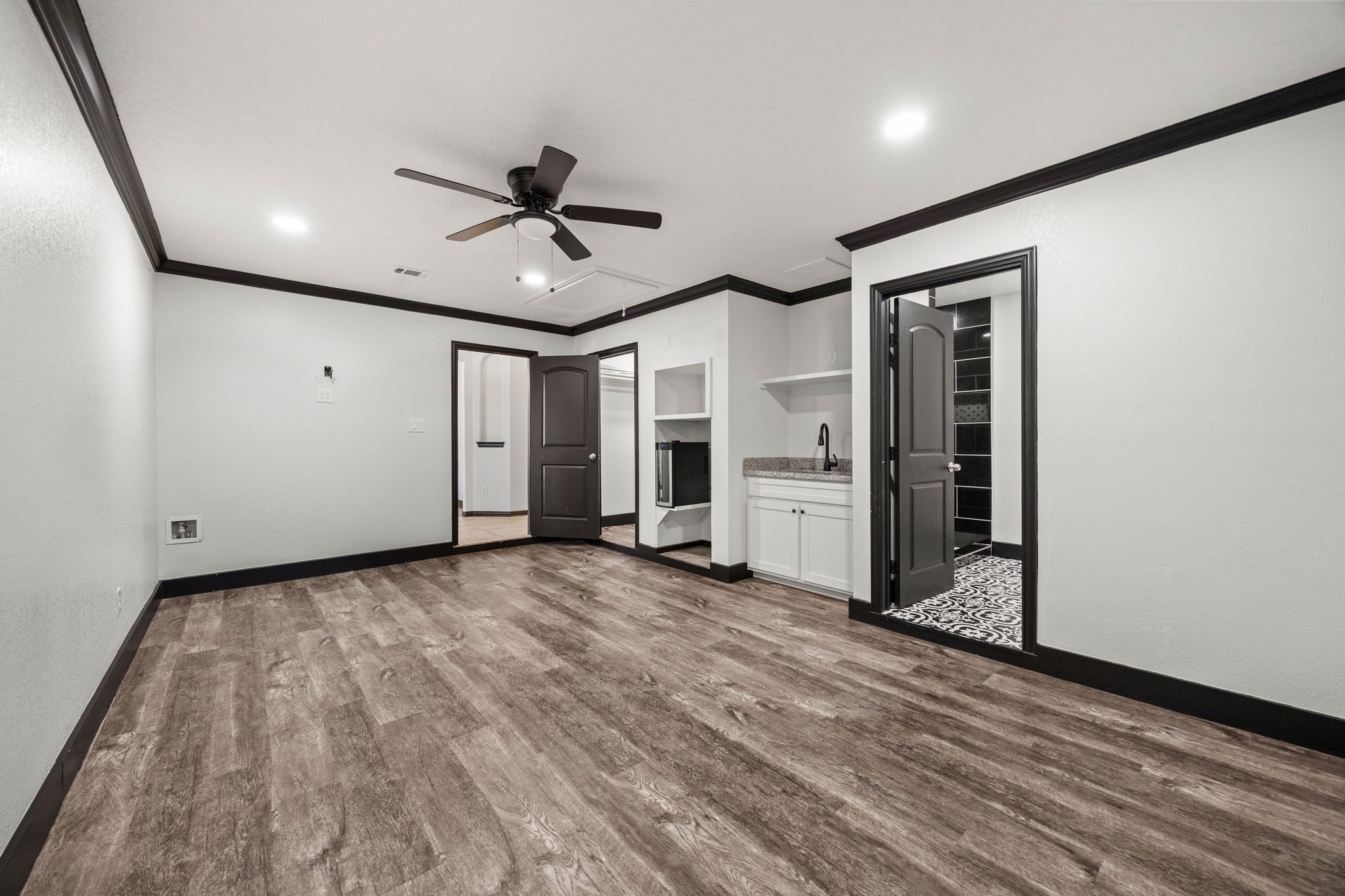 4342 Ambrosia Lane Baytown, TX 77521 - Photo 28 of 34 a view of a livingroom with a ceiling fan ceiling fan and window