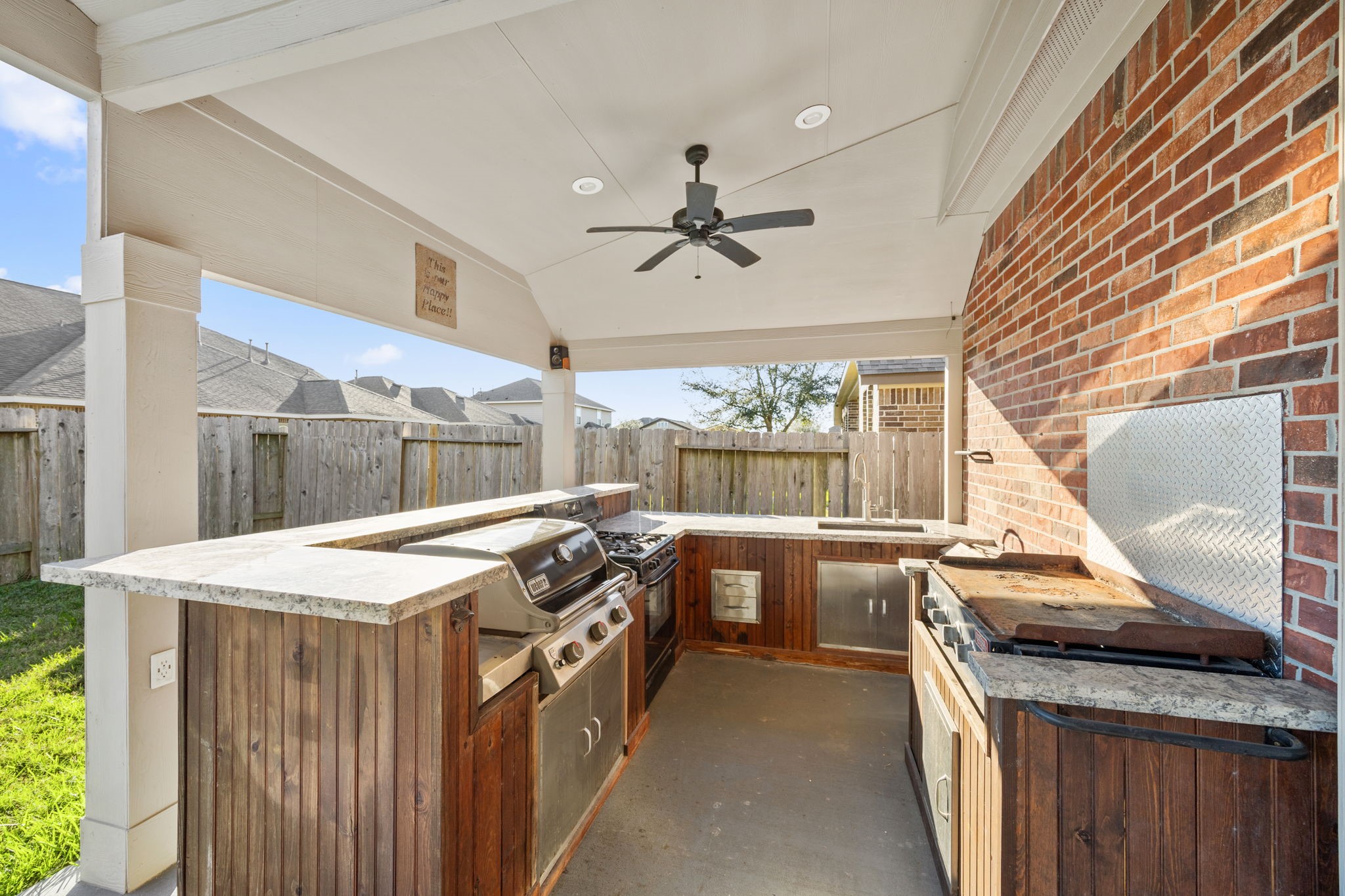 4342 Ambrosia Lane Baytown, TX 77521 - Photo 30 of 34 a kitchen that has a stove and a table