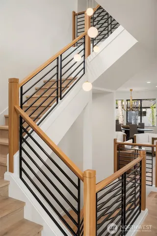 a kitchen with a sink and a washer dryer