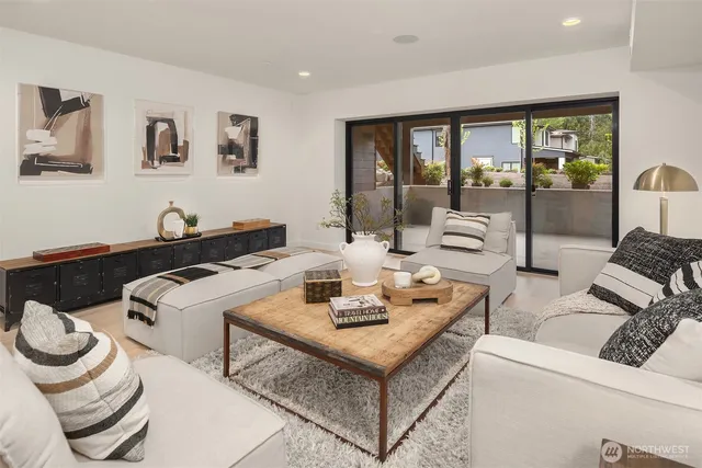 a bathroom with a sink toilet a mirror and shower