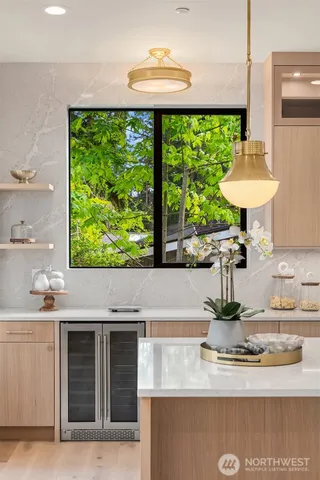 a kitchen with granite countertop a stove and a sink