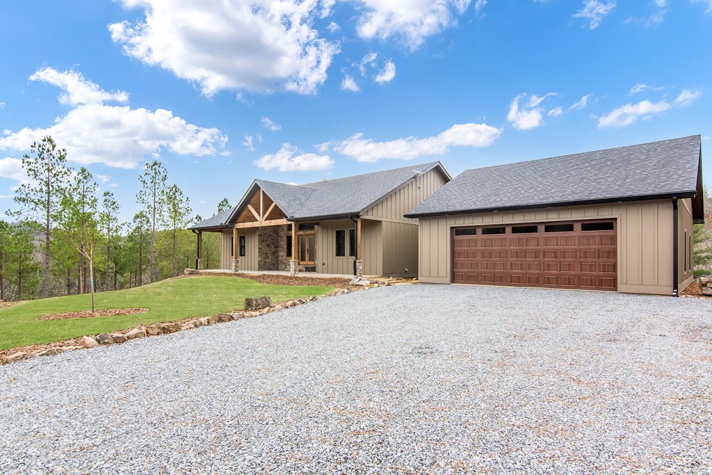 2468 Twisted Oak Road Talking Rock, GA 30175 - Photo 2 of 67 a large house with a big yard and large trees
