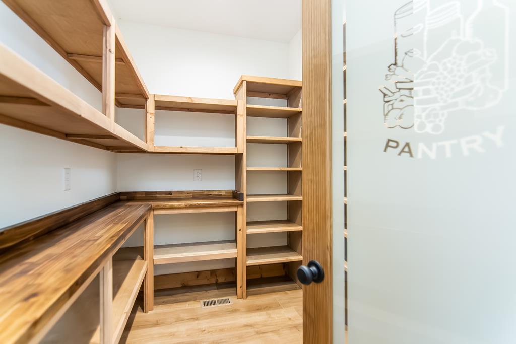 2468 Twisted Oak Road Talking Rock, GA 30175 - Photo 39 of 67 a view of walk in closet with empty racks
