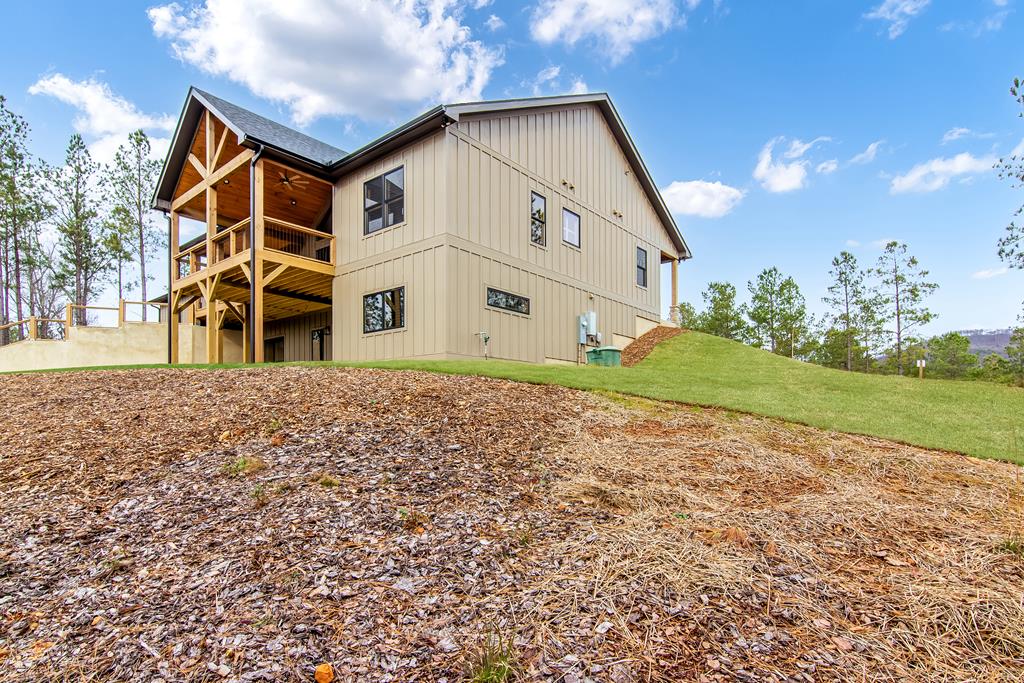 2468 Twisted Oak Road Talking Rock, GA 30175 - Photo 49 of 67 a view of a house with a yard