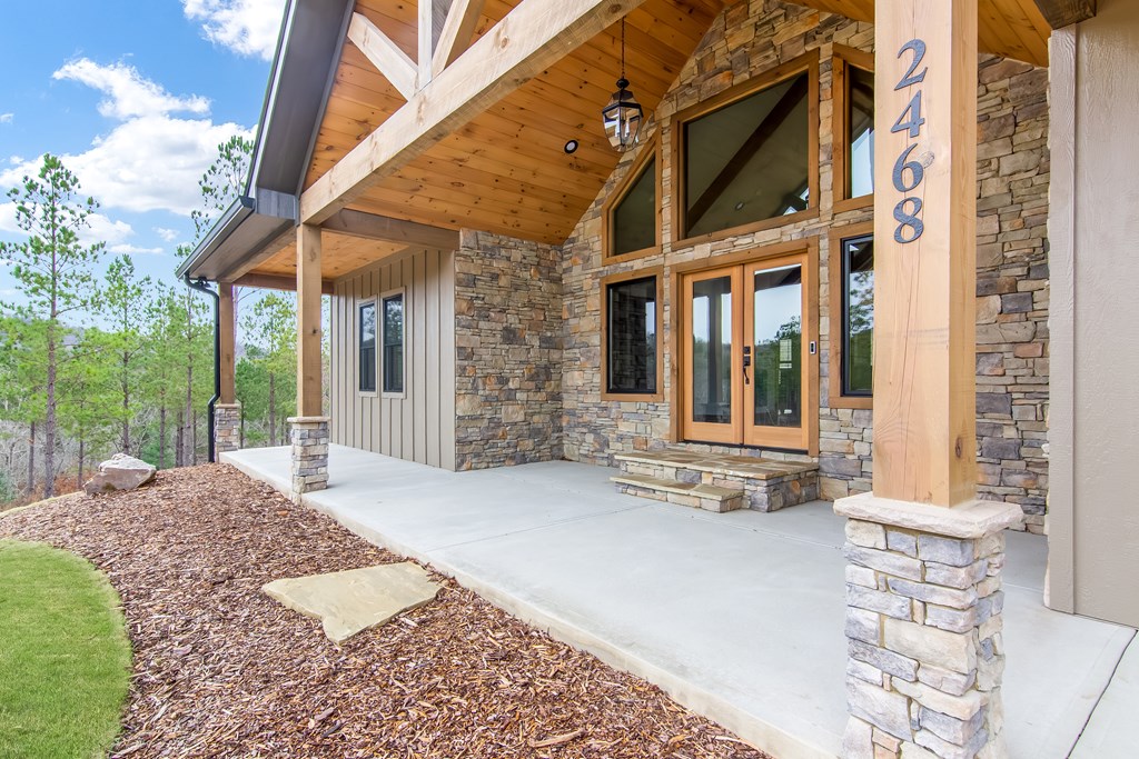 2468 Twisted Oak Road Talking Rock, GA 30175 - Photo 5 of 67 a view of a house with a large window