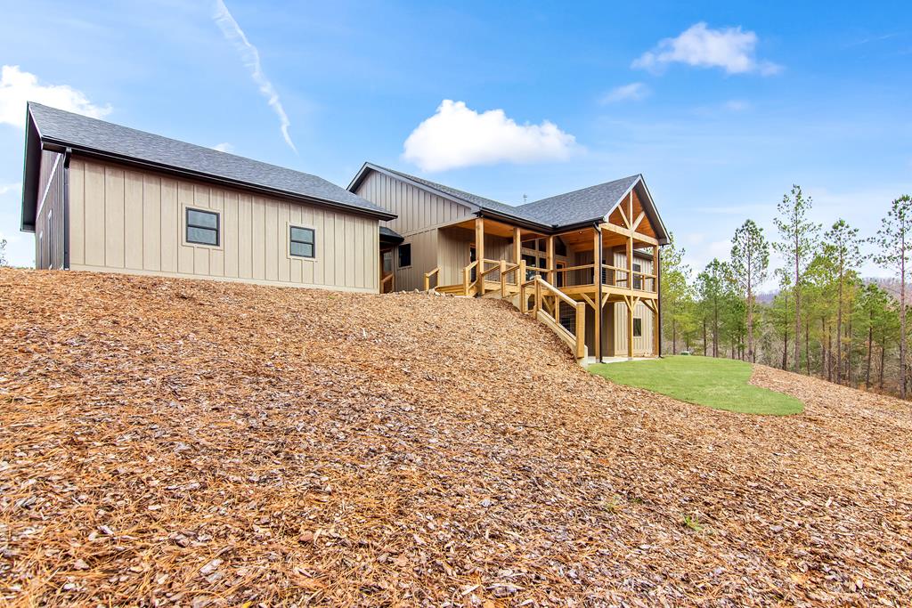 2468 Twisted Oak Road Talking Rock, GA 30175 - Photo 51 of 67 a front view of a house with a yard