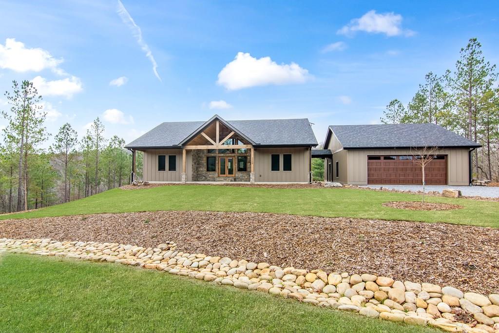 2468 Twisted Oak Road Talking Rock, GA 30175 - Photo 65 of 67 a front view of a house with a yard