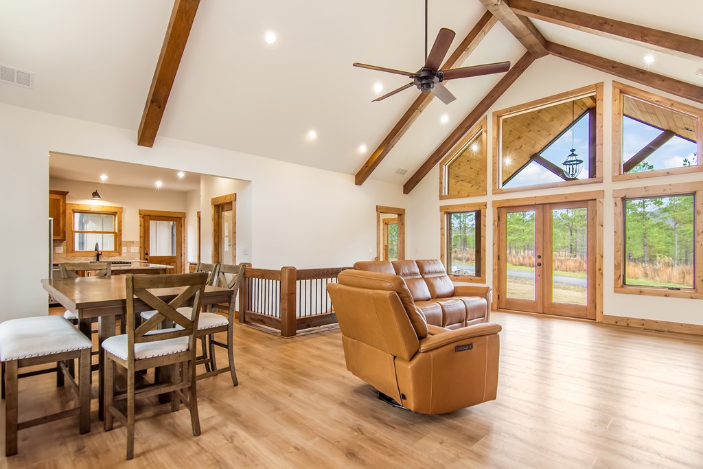 2468 Twisted Oak Road Talking Rock, GA 30175 - Photo 8 of 67 a living room with furniture and a large window