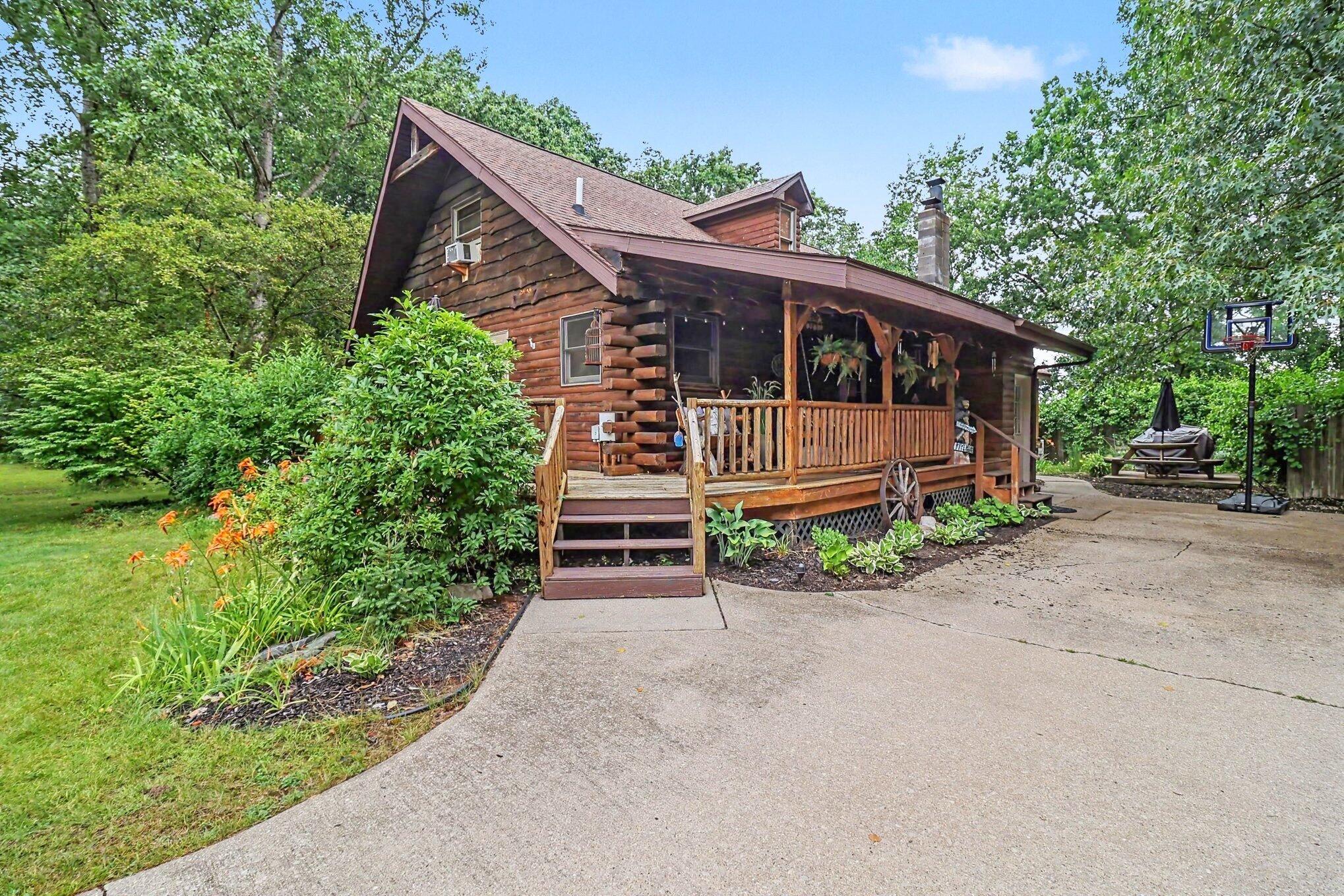 1384 Olson Road Manistee, MI 49660 - Photo 1 of 35 Exterior