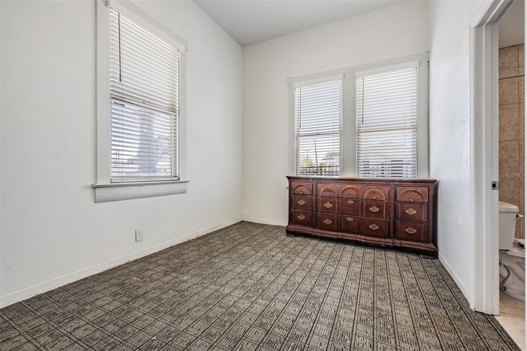 2319 West Aileen Street Tampa, FL 33607 - Photo 20 of 26 an empty room with windows