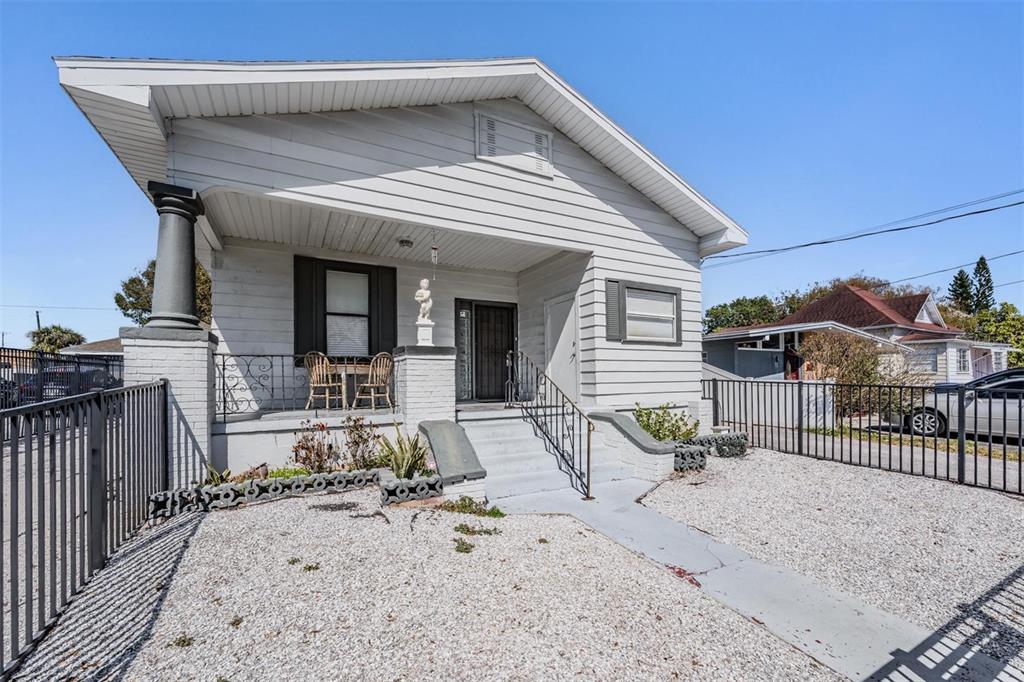 2319 West Aileen Street Tampa, FL 33607 - Photo 2 of 26 a view of a house with wooden deck