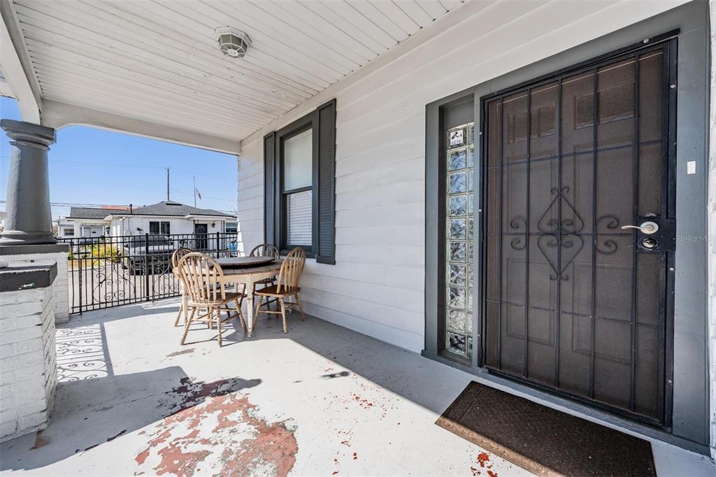 2319 West Aileen Street Tampa, FL 33607 - Photo 5 of 26 a living room with stainless steel appliances kitchen island granite countertop furniture and a rug