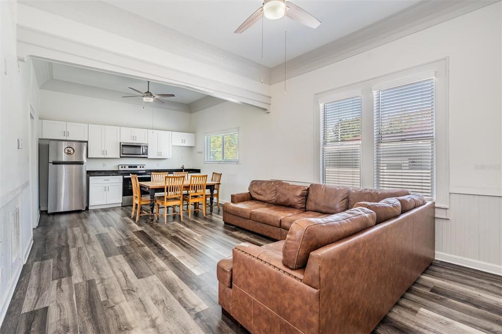 2319 West Aileen Street Tampa, FL 33607 - Photo 6 of 26 a living room with stainless steel appliances furniture and a kitchen view