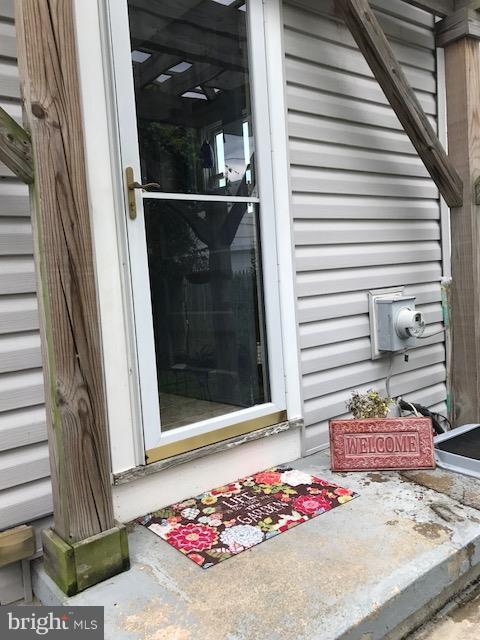 1704 Leslie Road Baltimore, MD 21222 - Photo 22 of 24 a view of a balcony with a potted plant