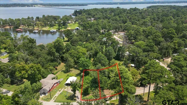 a view of a lake with a house