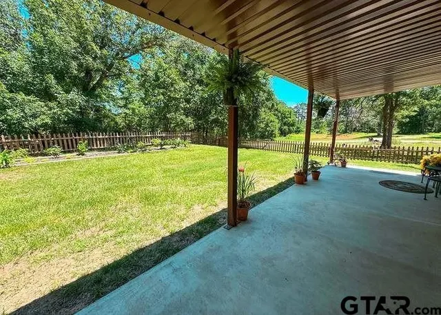 a view of an outdoor space and swimming pool