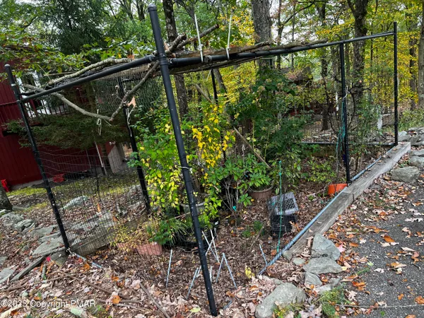 a kitchen with a sink a counter and cabinets