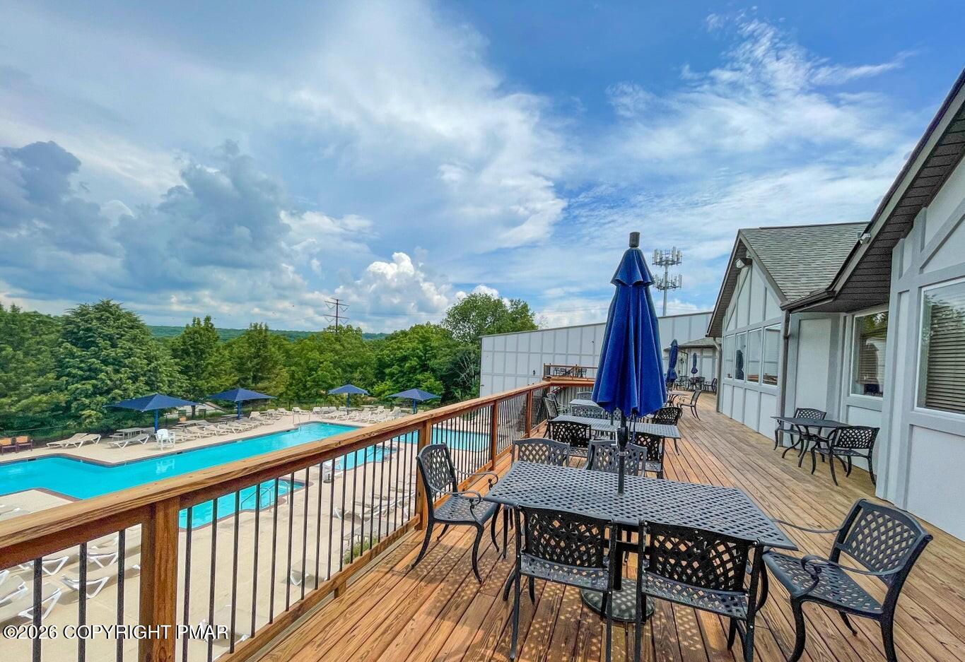 124 Saunders Drive Bushkill, PA 18324 - Photo 33 of 43 a view of a chairs and table in the balcony