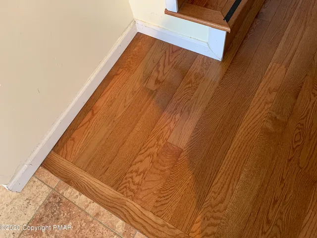 a bathroom with a sink a toilet and bathtub